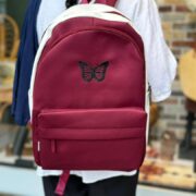 کوله پشتی دورنگ زرشکی طرح پروانه